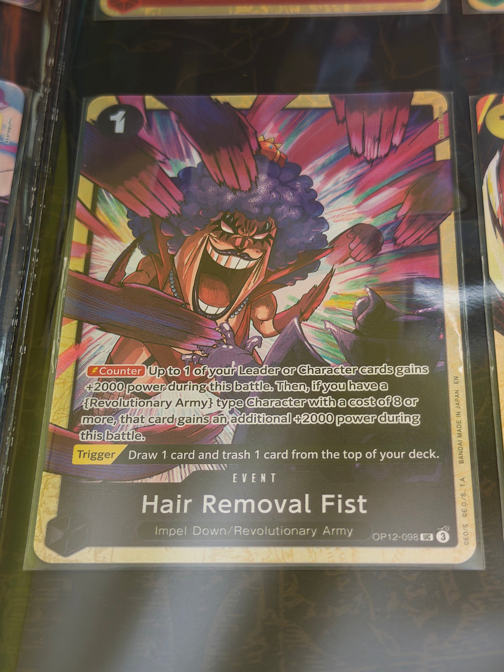 Carta Hair Removal Fist de One Piece Card Game incluida en Premium Card Collection Best Selection Vol.5.