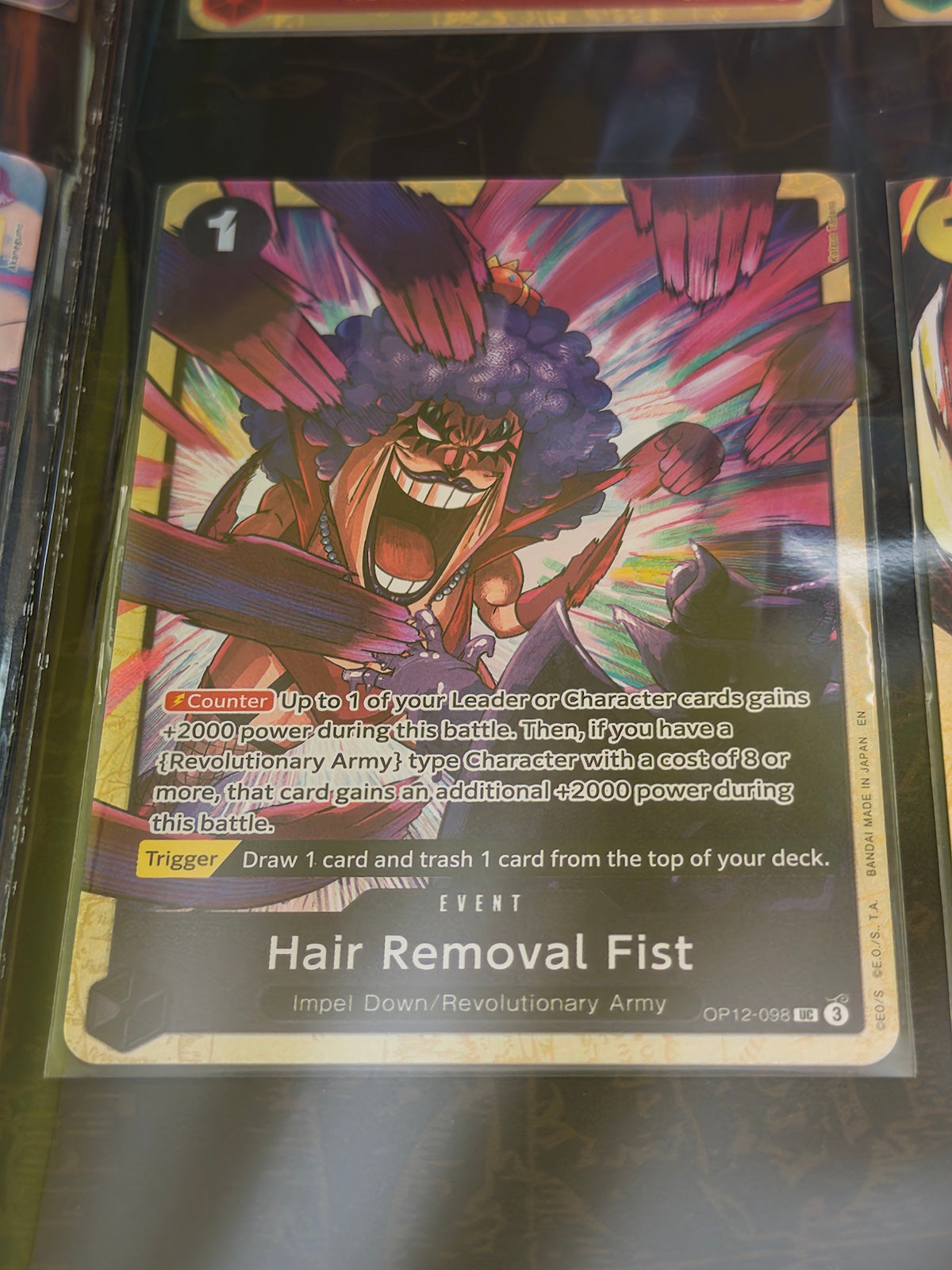Carta Hair Removal Fist de One Piece Card Game incluida en Premium Card Collection Best Selection Vol.5.