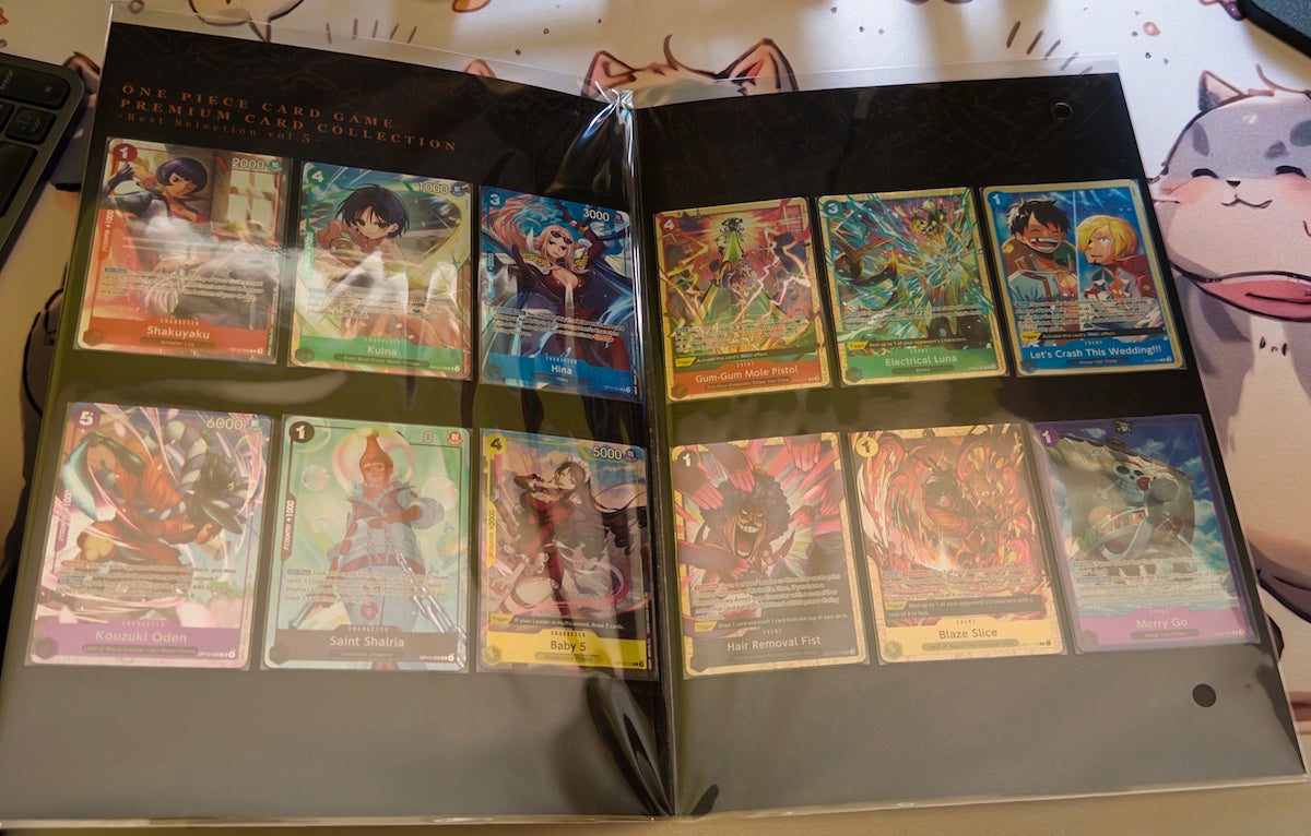Premium Card Collection Best Selection Vol.5 One Piece abierta mostrando las 12 cartas premium.