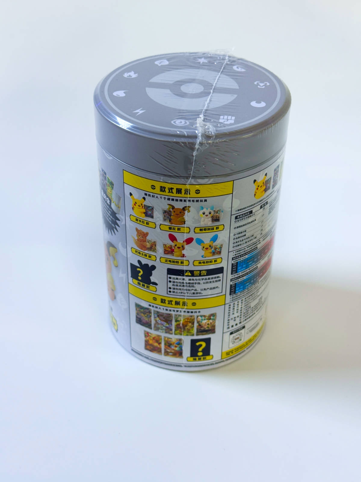 Pokémon Electric Plush Blind Box Tin Chinese (ZH) vista trasera con detalles del contenido