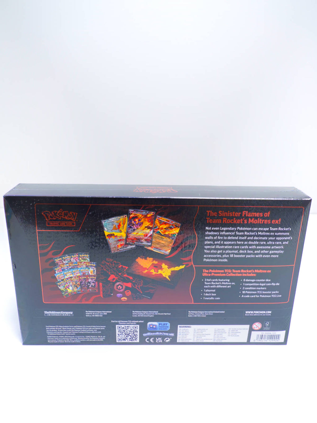 Parte trasera Pokémon Team Rocket Moltres ex Ultra Premium Collection contenido