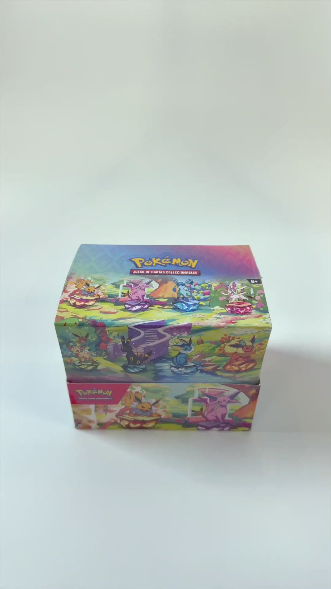 Video del display de Mini Tins Pokémon Evoluciones Prismáticas en español mostrando el producto en 360 grados