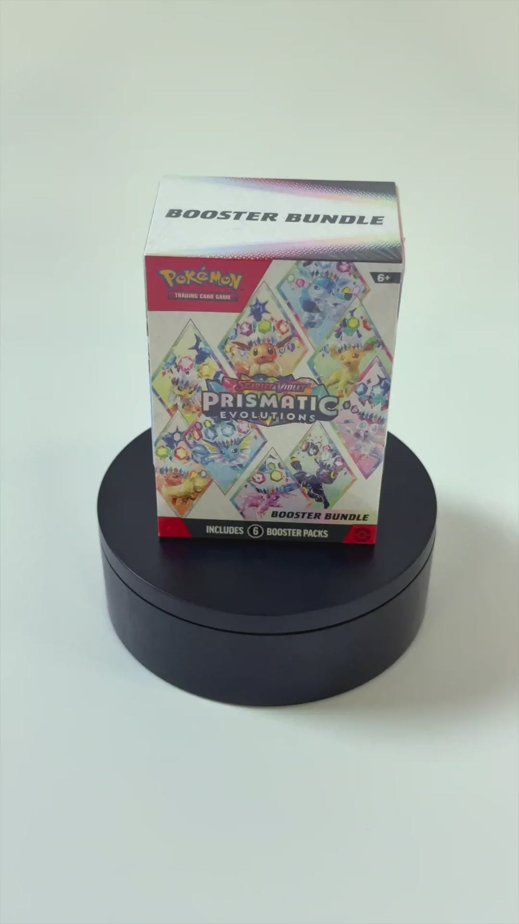 Video del Pokémon Prismatic Evolutions Booster Bundle (EN) mostrando el producto en plataforma giratoria 360 grados